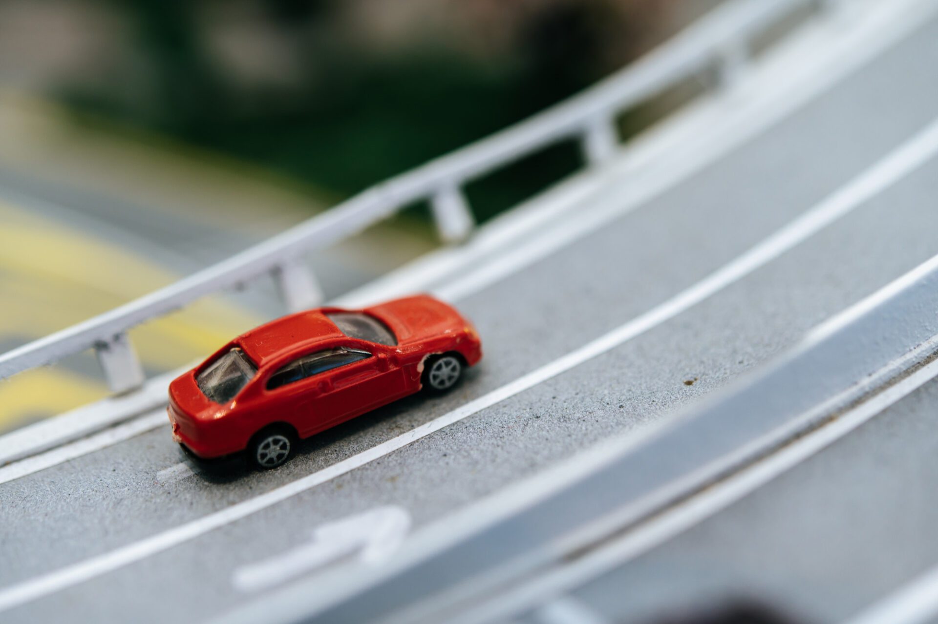 Close up of small cars model on the road, traffic conception.